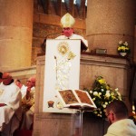 Bishop Toal with the Book of Kells