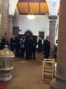 Br. John's coffin is taken to its final resting place