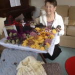 Sr. Pat with samples of her crafts